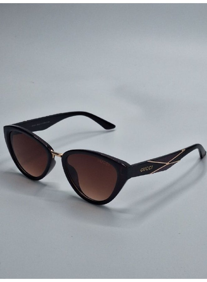 Gucci Women’s Cat-Eye Sunglasses – Black Frame with Brown Lenses